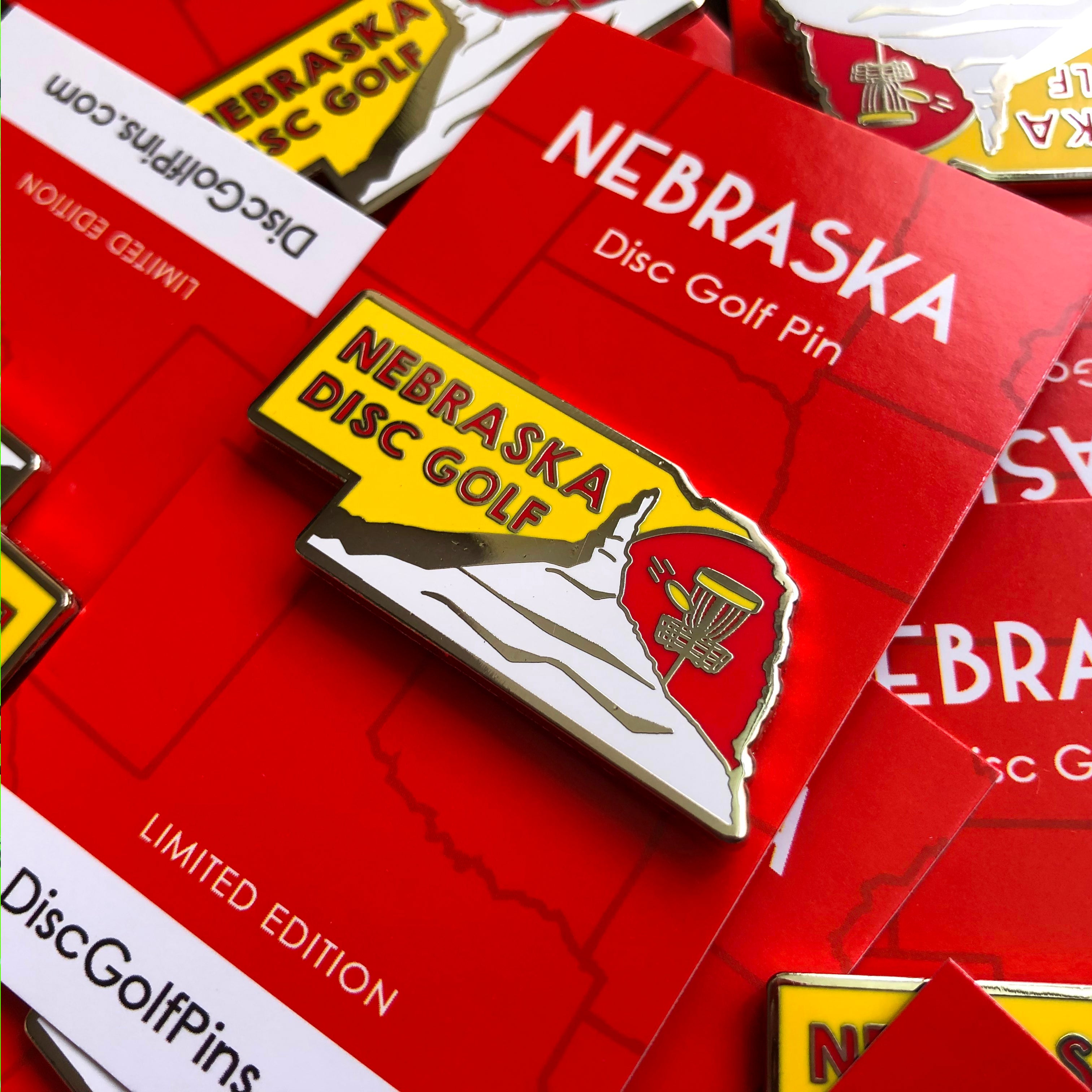 Nebraska Disc Golf Pin - Gotta Go Gotta Throw